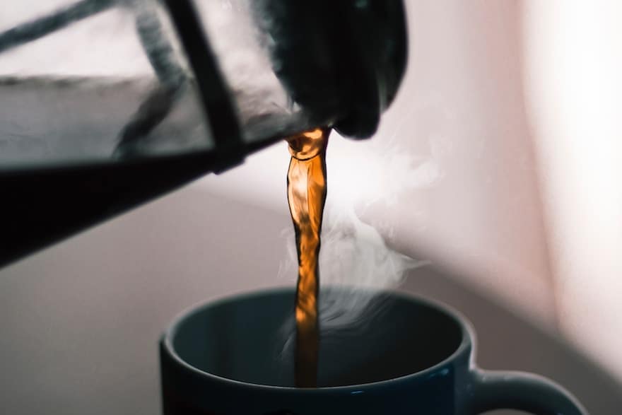 Pouring coffee from a French press