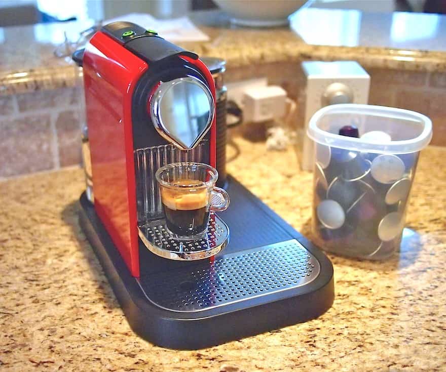 Nespresso Citiz machine pouring a shot of espresso