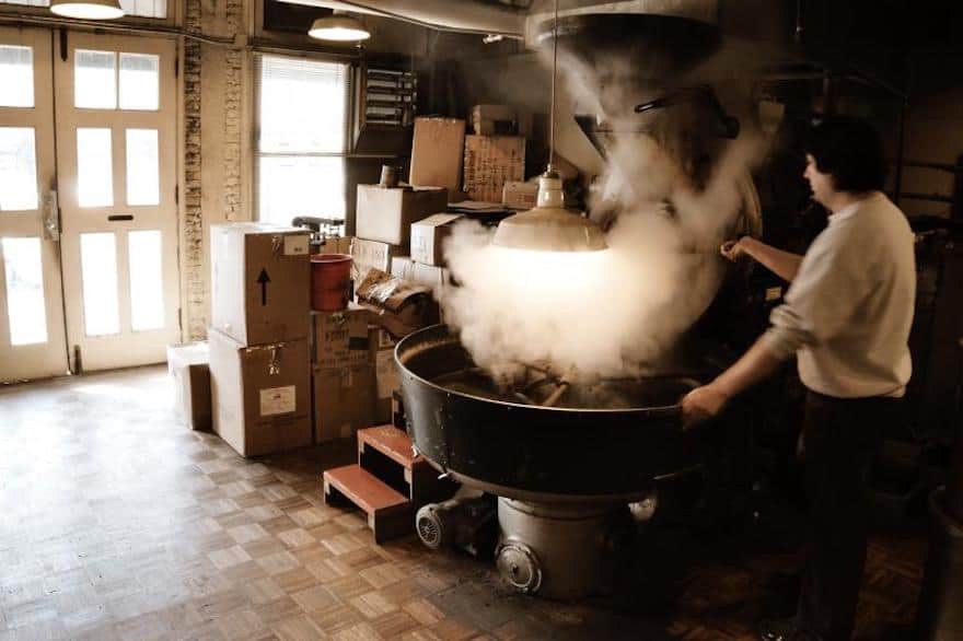Smoke rising from a coffee roaster