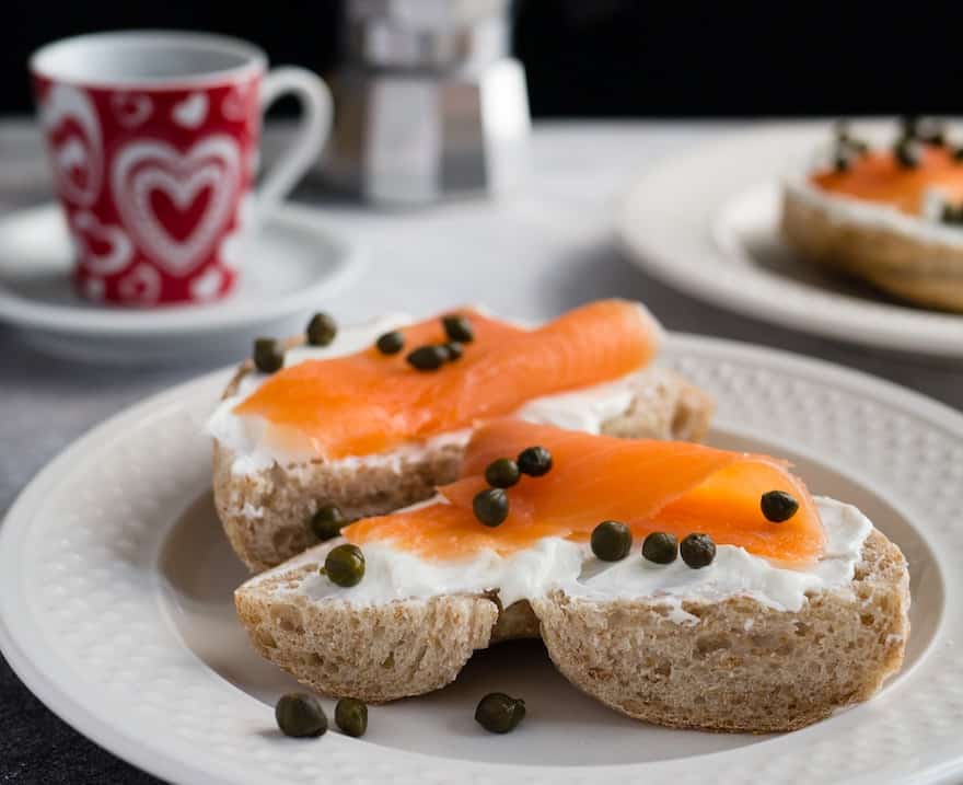 Bagel topped with cream cheese, smoked salmon and capers