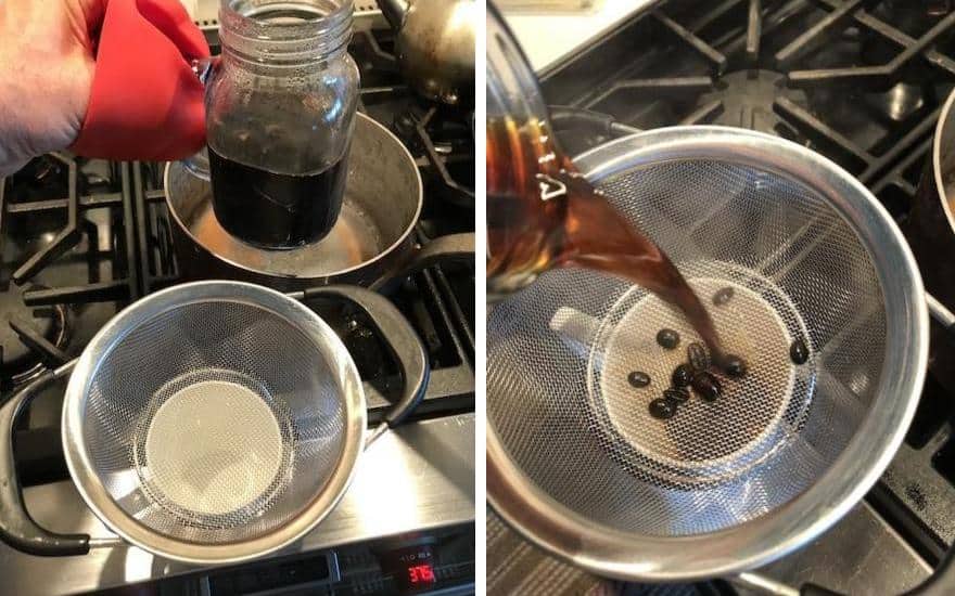 Lifting coffee from simmering water and straining into cup