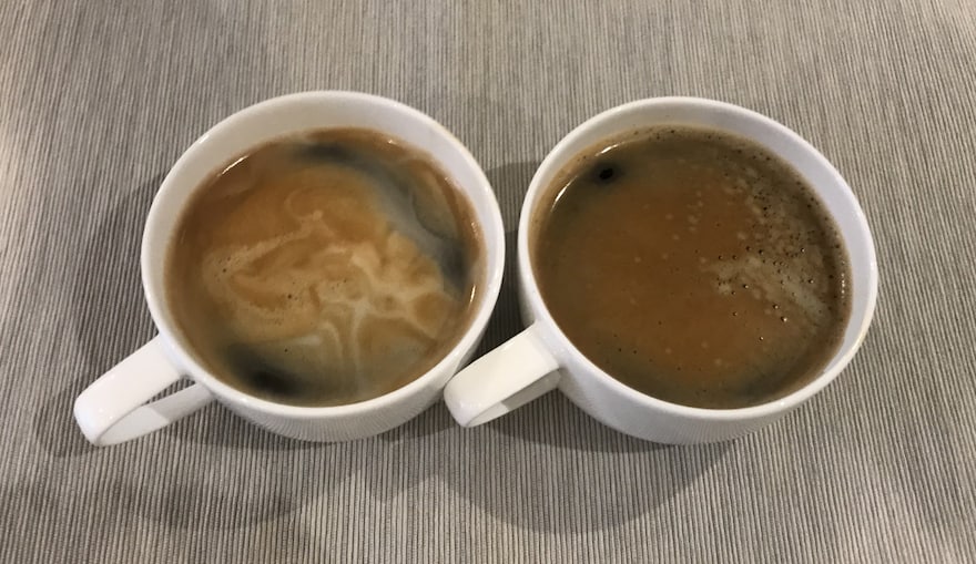 Long black coffee and a caffe Americano side by side, viewed from above