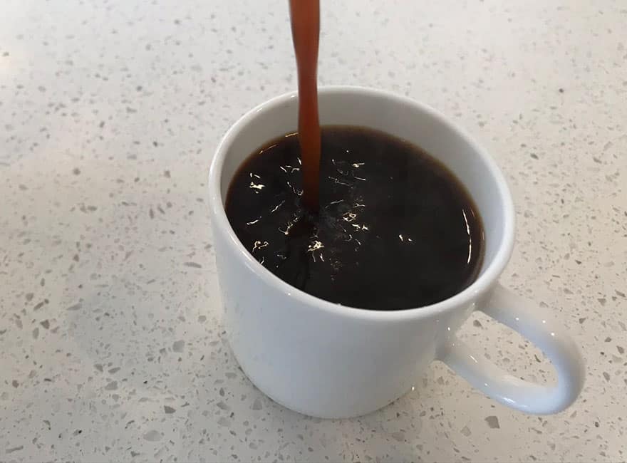 pouring moka pot coffee 0826