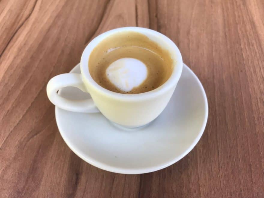 Macchiato means “stained” in Italian, which is what the milk does to your espresso.