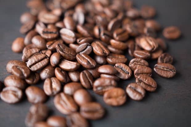 Coffee beans spread out on the counter