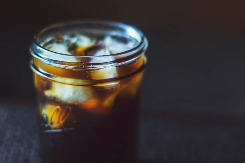 Coffee in a jar with ice cubes