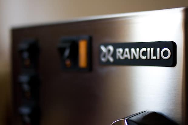 Branding on the front panel of a Rancilio espresso machine