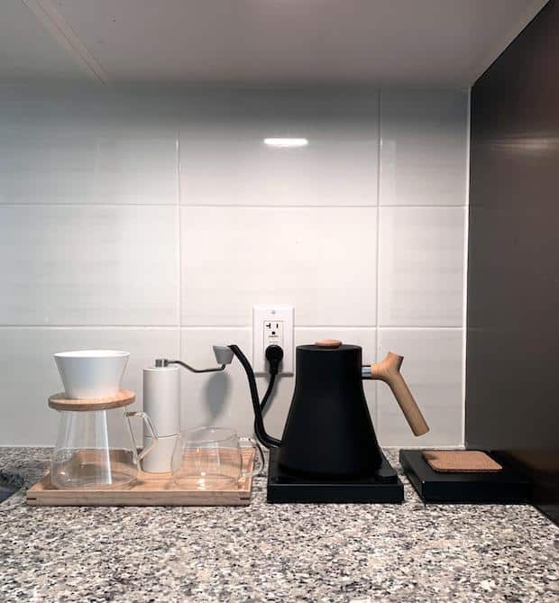 Minimalist coffee station on a kitchen counter
