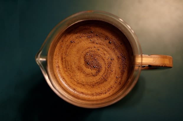 View looking straight down into a carafe of French press coffee from above