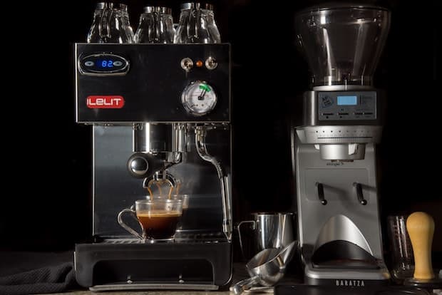 Lelit espresso machine next to a grinder