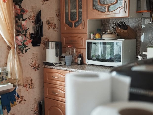 Microwave sitting on the counter in a kitchen