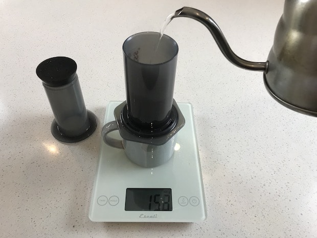 Pouring hot water into an AeroPress