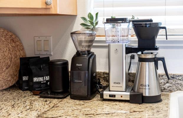 Coffee grinder and coffee machine in kitchen
