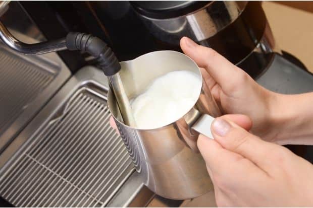 Frothing milk with a steam wand