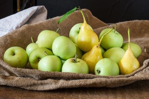 Coffee contains malic acid, just like these pears and green apples