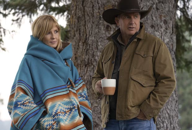 John Dutton sips coffee from his mug while speaking with daughter Beth on the Yellowstone ranch