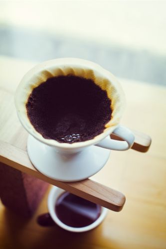 Pour-over coffee stand set up after brewer learned how to aerate coffee