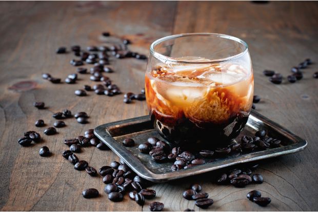 Glass of Kahlua liqueur that can work as a liquor for coffee