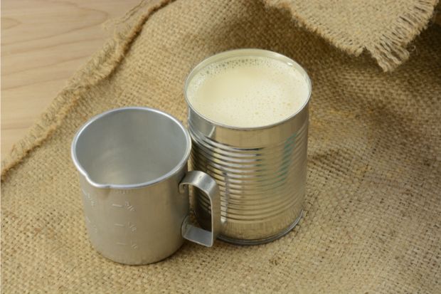 Can of evaporated milk that can go in coffee