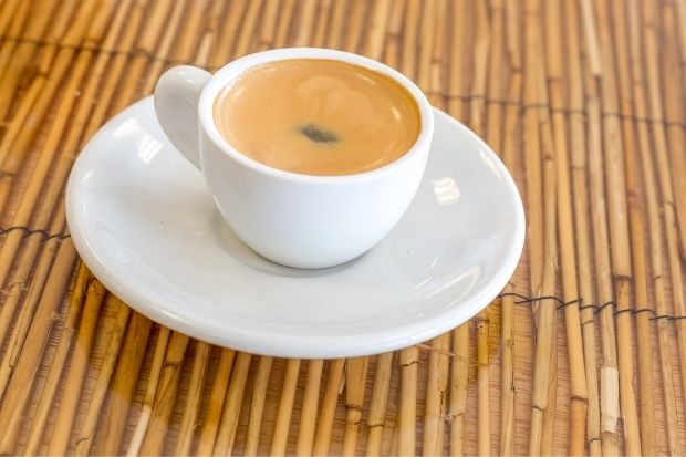 A small cup of colada coffee