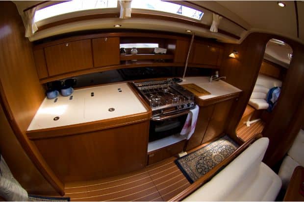 Interior kitchen space in a boat that has room for one of the best coffee makers for boats