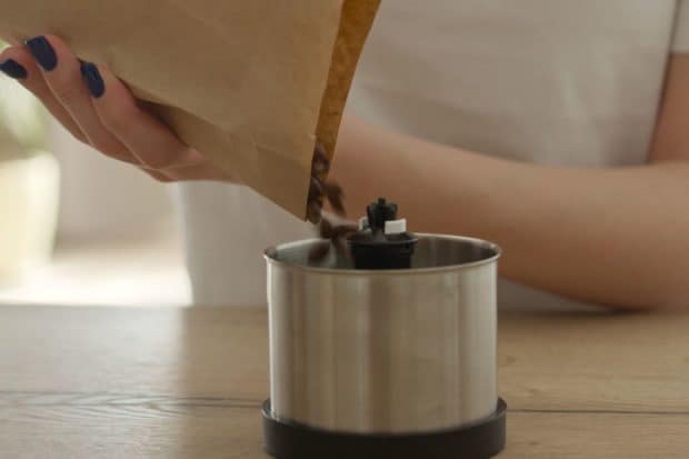 Grinding coffee beans after buying them