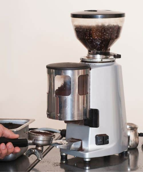 Burr grinder for espresso dispensing coffee grounds