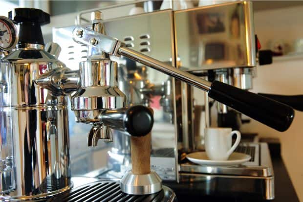 Manual espresso machine on the counter of a coffee shop