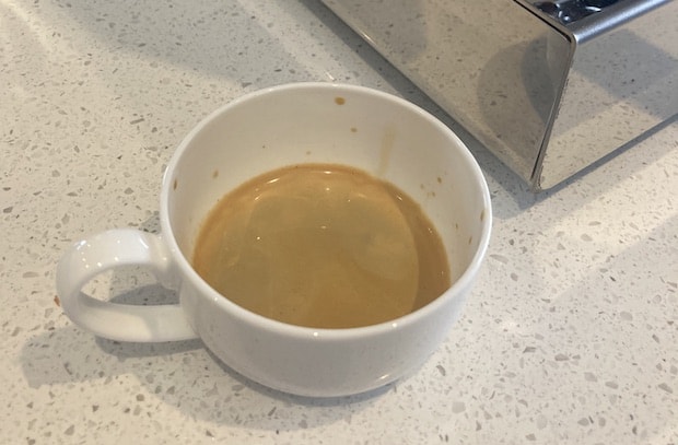 Small cup of espresso with rich crema