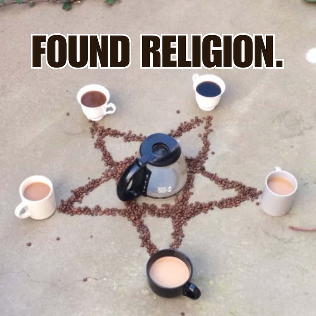 Five coffee mugs arranged at the points of a coffee-bean pentagram on the sidewalk, with a coffee pot in the middle and the caption: Found religion.