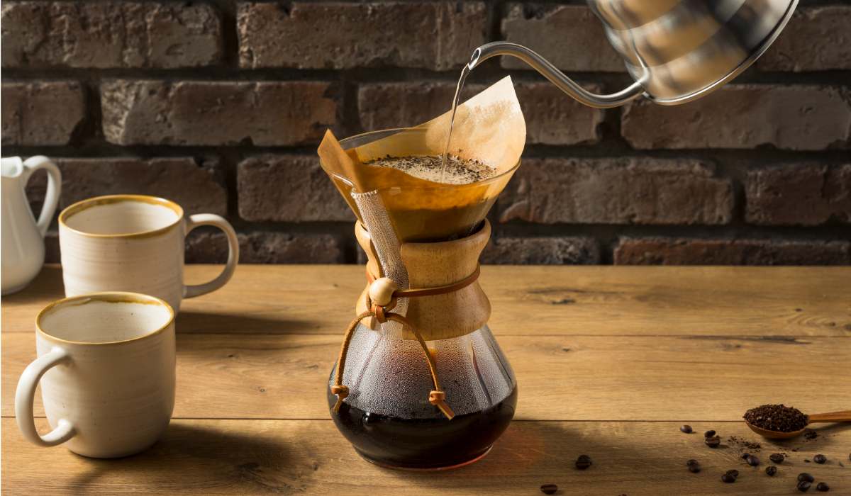 A Chemex coffee maker in mid-brew.