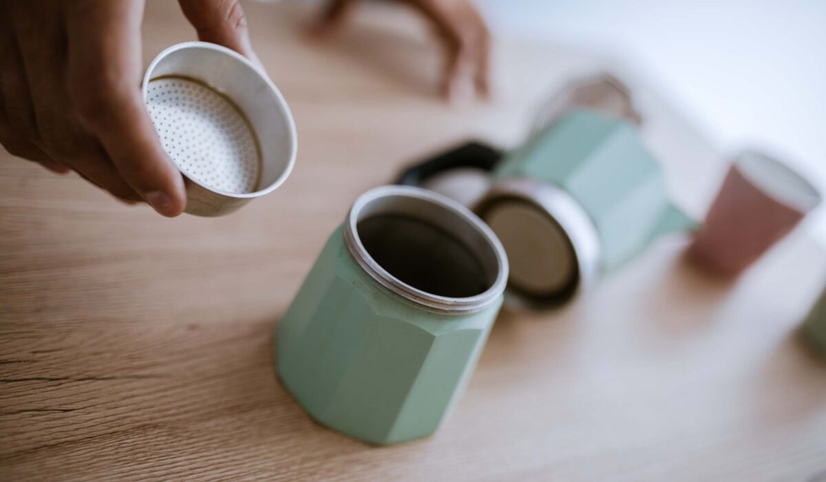 Moka pot coffee maker in its three pieces